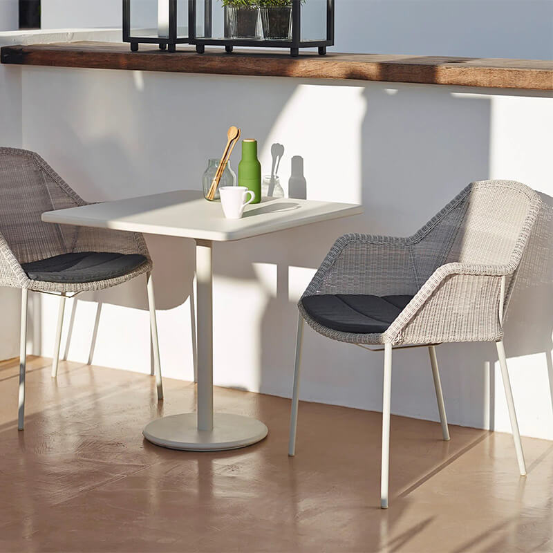 Folding patio table with teak