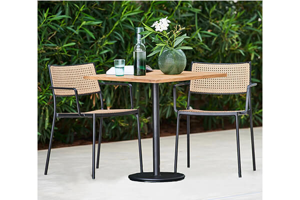 Folding patio table with teak